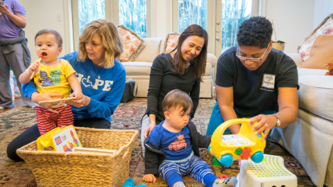 Group of Early Childhood Intervention clients playing