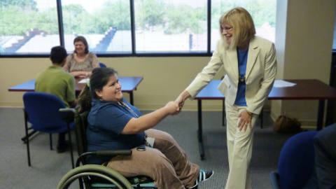 Mentee and Mentor shaking hands